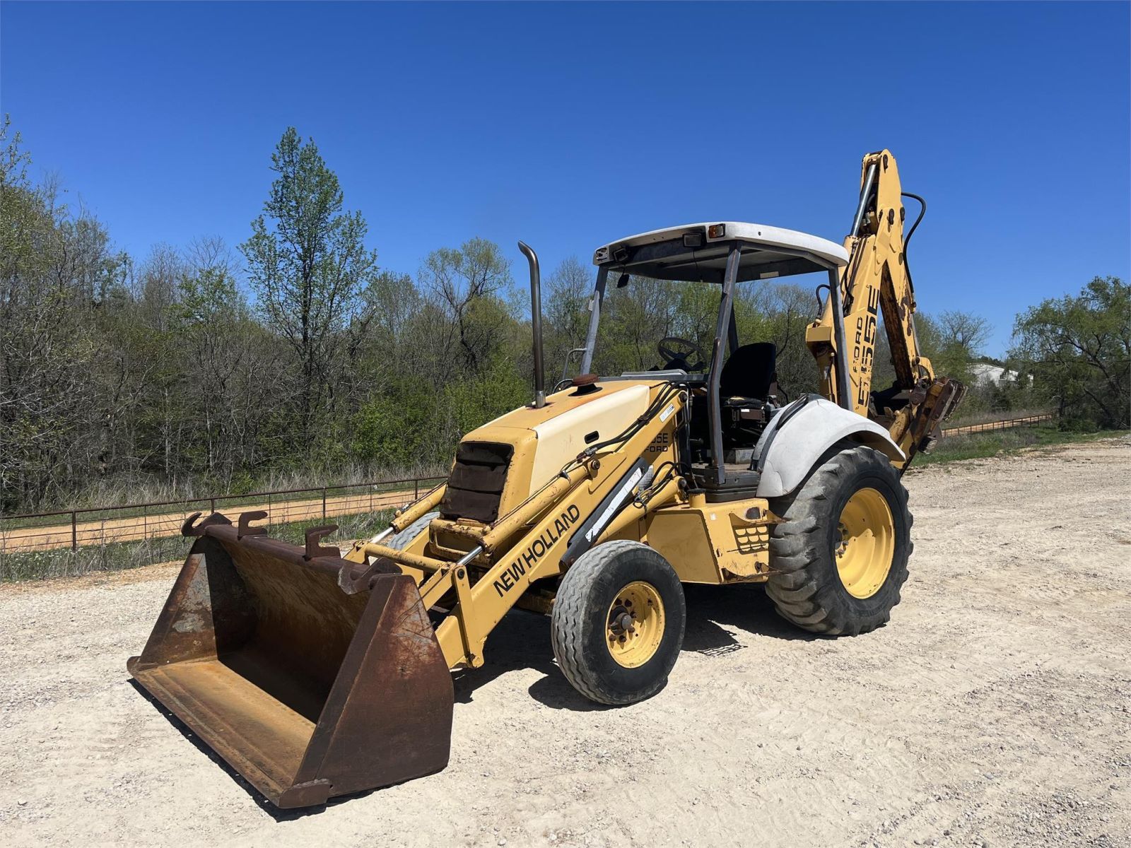 New Holland 555E Backhoe Loader